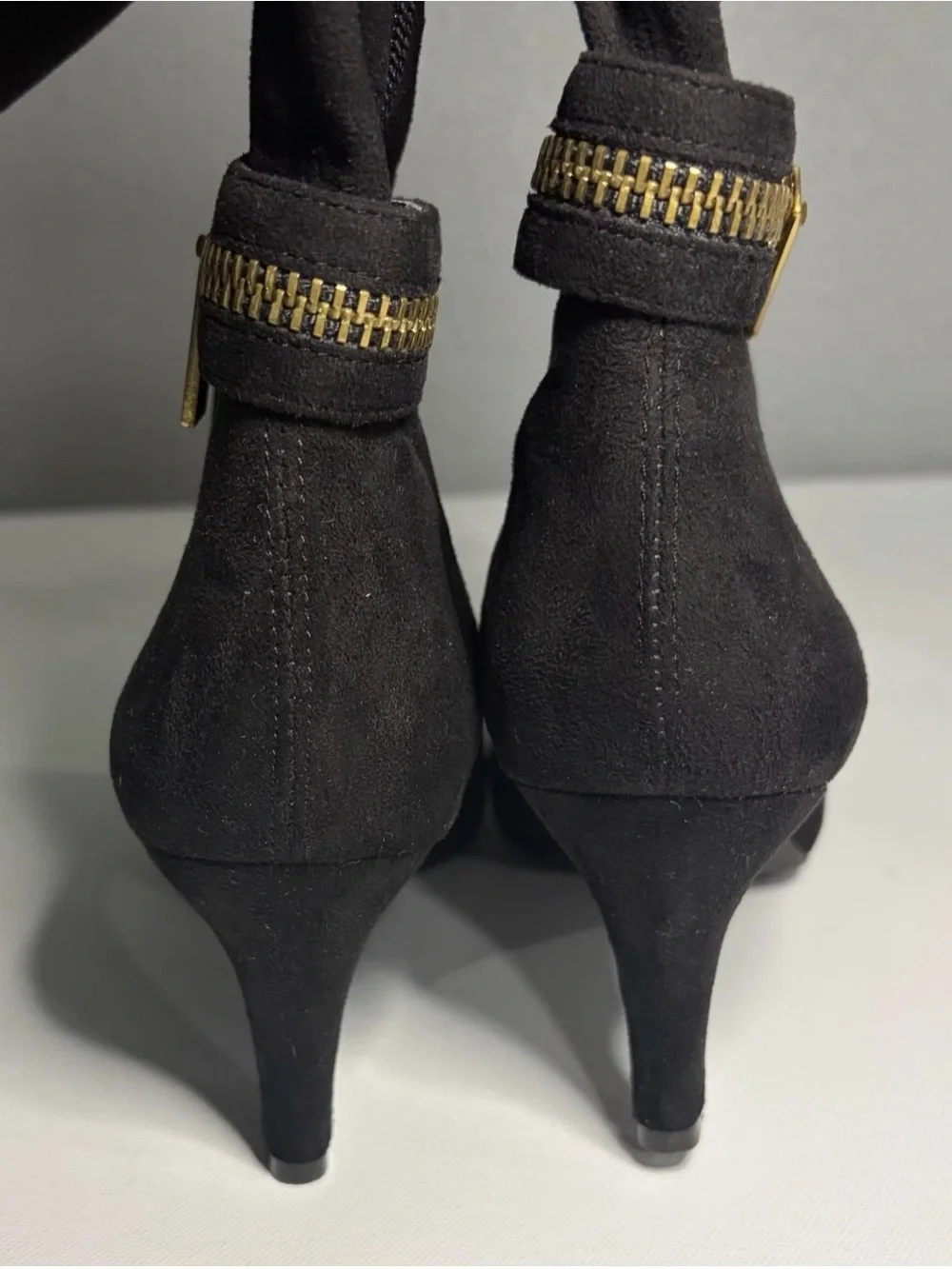 BCBG Black Over-the-Knee Suede Heeled Boots with Gold Zipper Detail